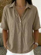 JUNE | BLUSA CON SUELTO Y BOTONES