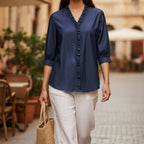 TINA | BLUSA CON VOLANTES Y CUELLO EN V