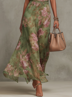 LIVIA |  VESTIDO CON CUELLO HALTER Y ESTAMPADO FLORAL
