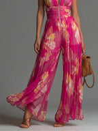 ZOFÍA - MONO CHIFÓN CON ESTAMPADO FLORAL FUCSIA