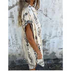 EMMELINE | VESTIDO CON BOLSILLOS ESTAMPADO